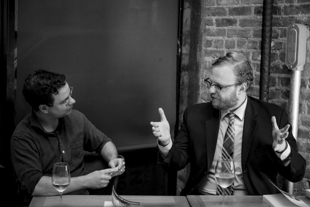 Dan Hetteix and Henry Stewart talking at the Owl's Head Wine Bar